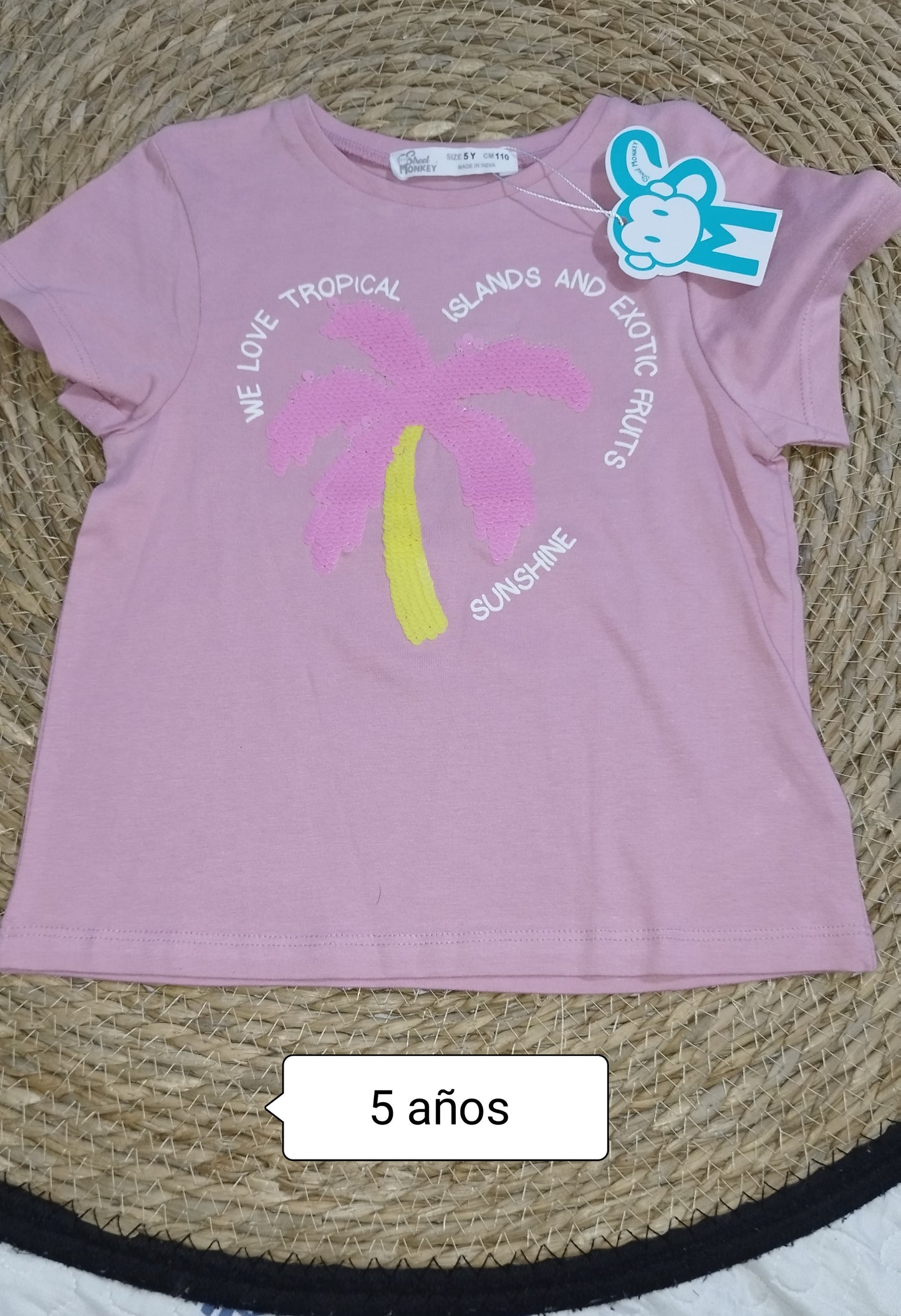Camiseta niña rosa palmera tropical