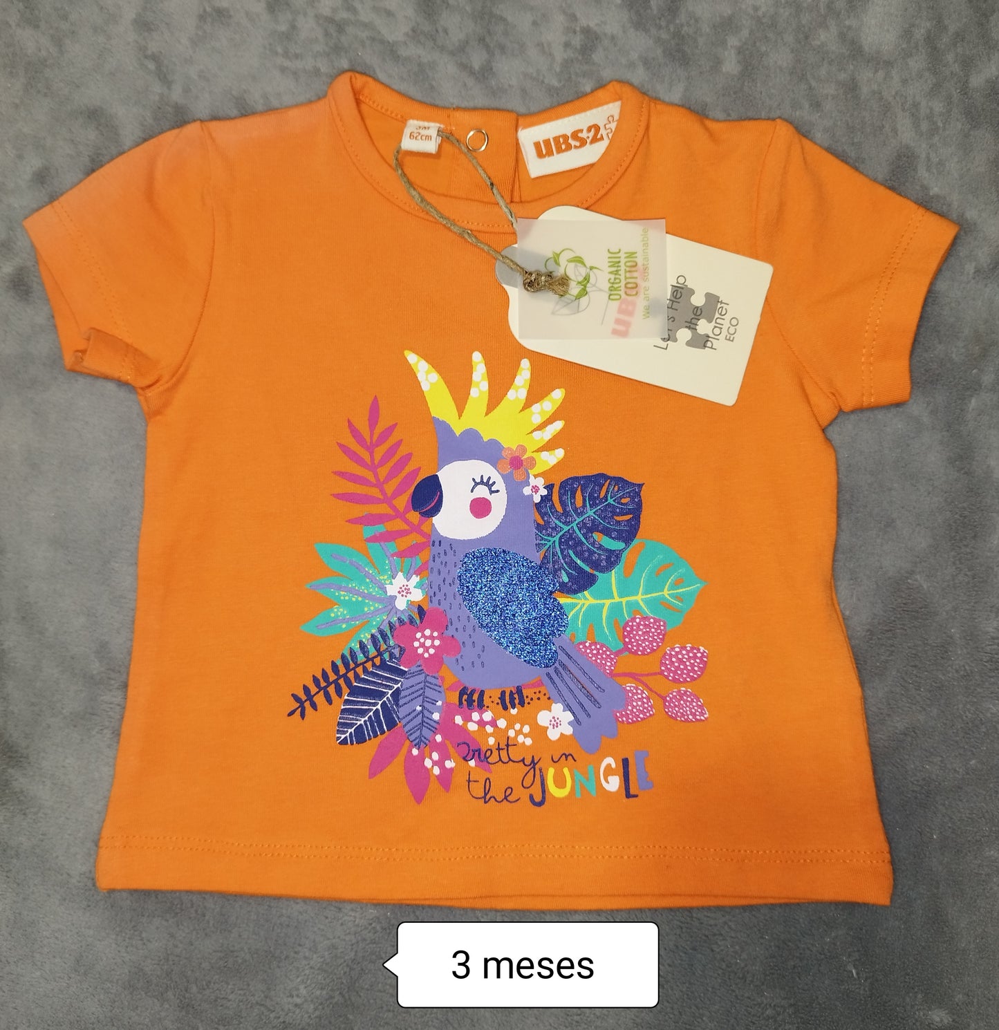 Camiseta bebé naranja pájaro tropical