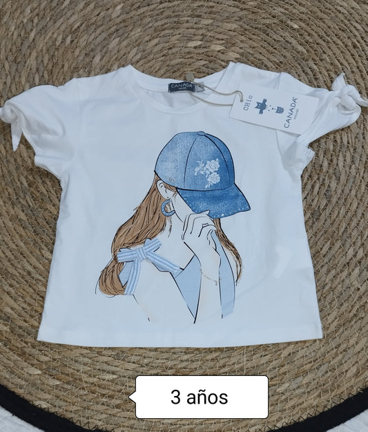 Camiseta niña blanca dibujo chica gorra moderna
