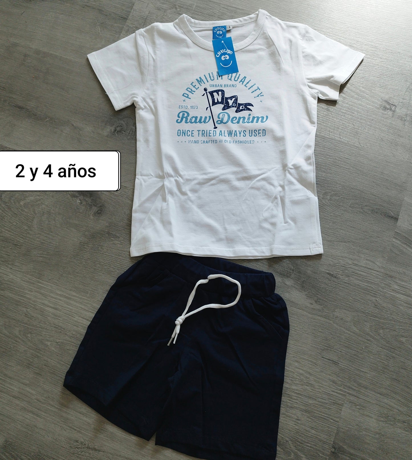 Conjunto niño camiseta blanca y short azul marino